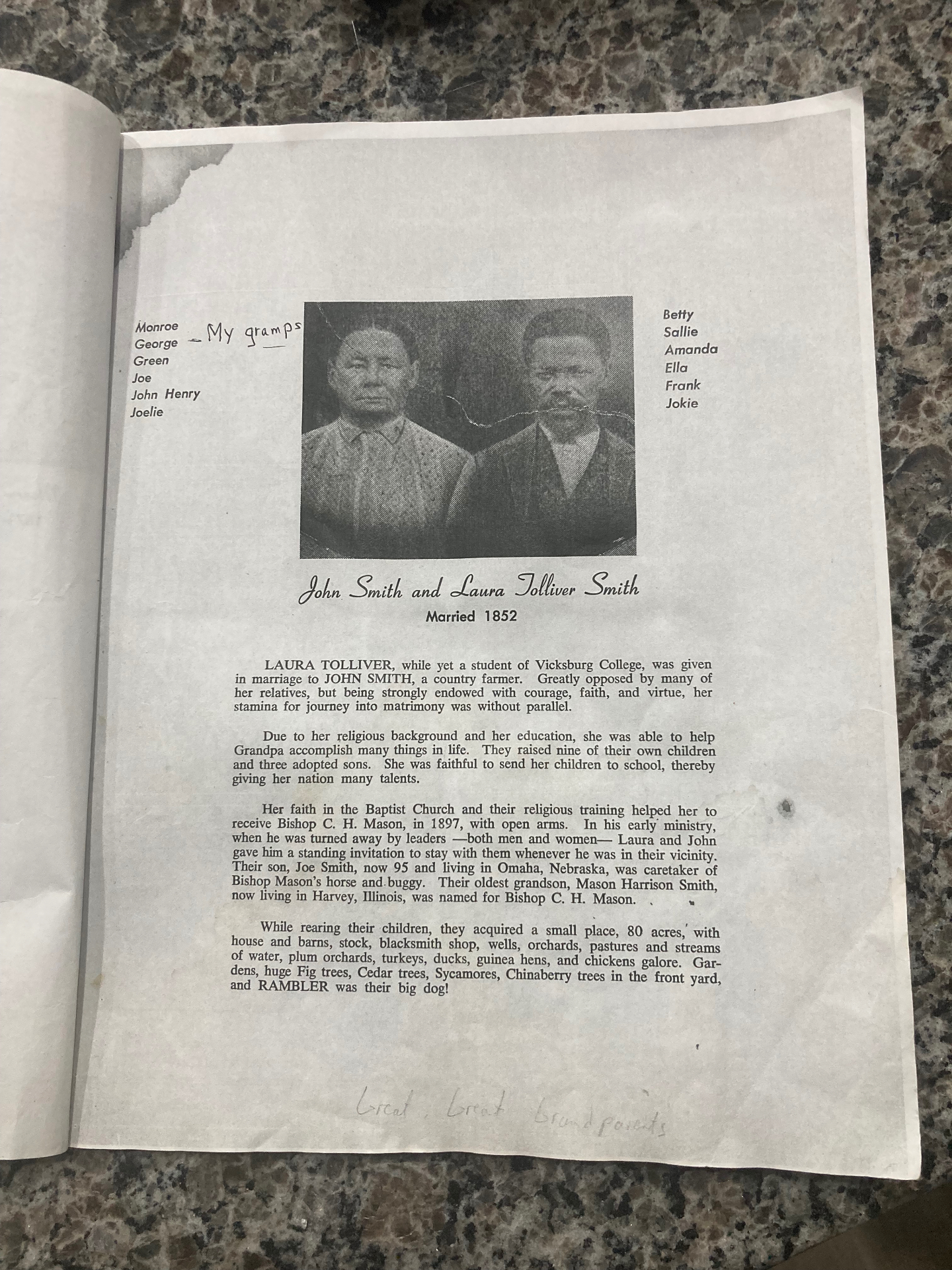 Scanned page of Alma Smith Spearman's family history, showing a halftone photograph of John Smith and Laura Tolliver Smith above a typed biographical narrative, with the names of their children written in the margins.